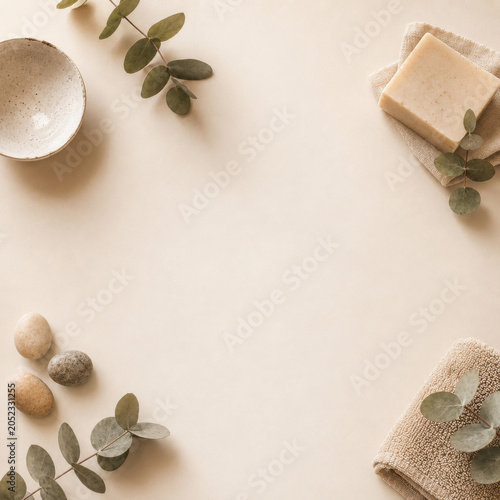 Natural soap spa skincare eucalyptus towel flat lay beige background copy space minimal still life, natural soap with towel, eucalyptus branch