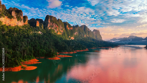 Canvastavla The green area at Khao Sok national park Cheow Lan Dam lake with blue sky backgr