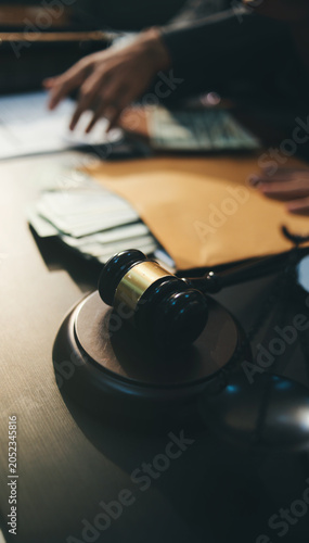 Lawyer explained to the client about the law that must be brought against the court case.