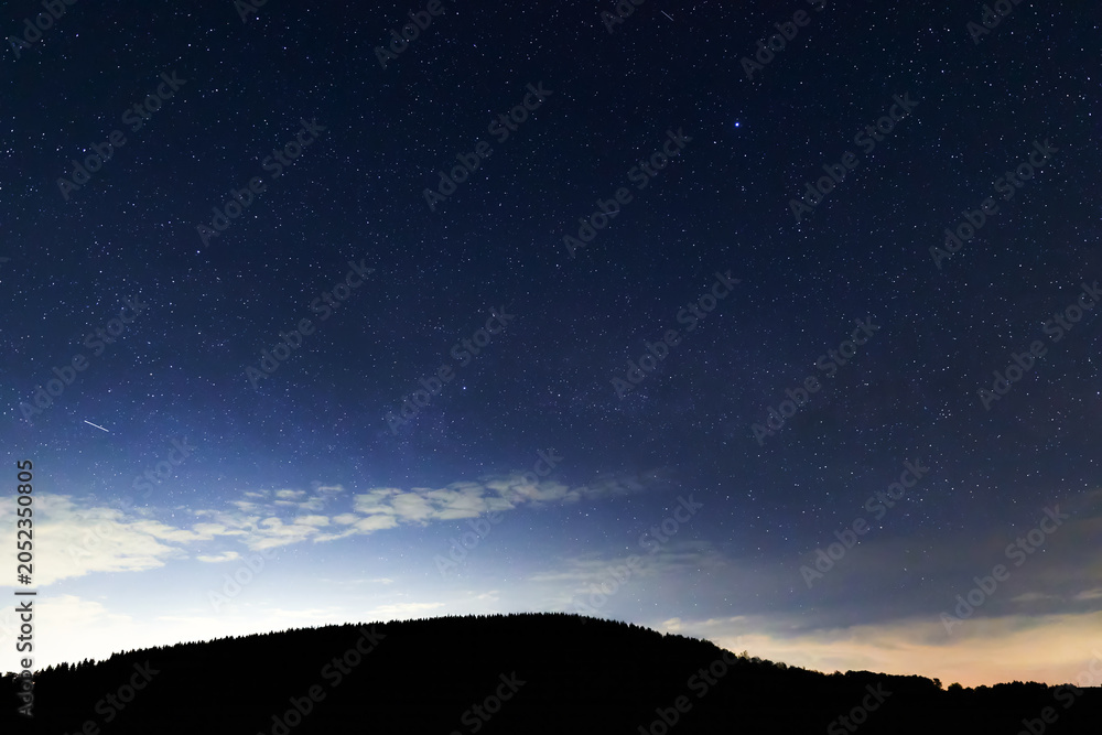 Obraz premium Constellations, landscape, Milky Way stars on a dark countryside skies.