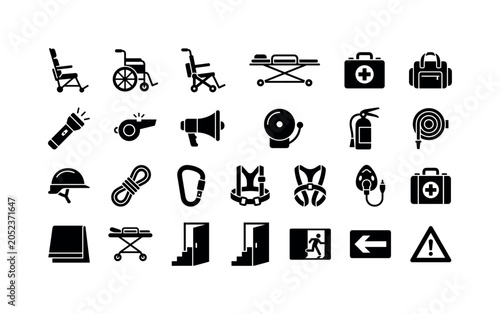 Emergency Evacuation Glyphs. Solid glyph icon set of evacuation and emergency escape equipment: evacuation chair, wheelchair, stair chair, rescue stretcher, first aid kit, emergency bag, flashlight,