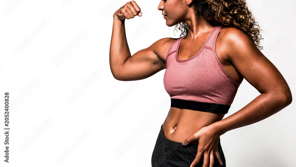 Fototapeta premium Strong woman in athletic pose