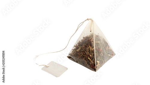 Photos Pyramid shaped mesh tea bag with dry herbal tea inside isolated on transparent b