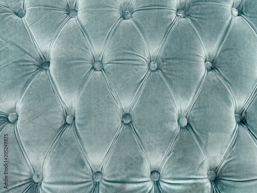 Konstfotografi Close up of cushion tufted upholstered panel in blue fabric color