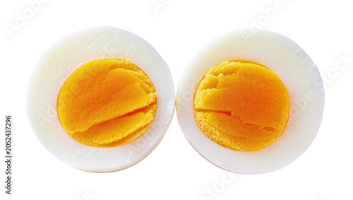 Obraz na plátně Two halves of hard-boiled egg with bright yellow yolk