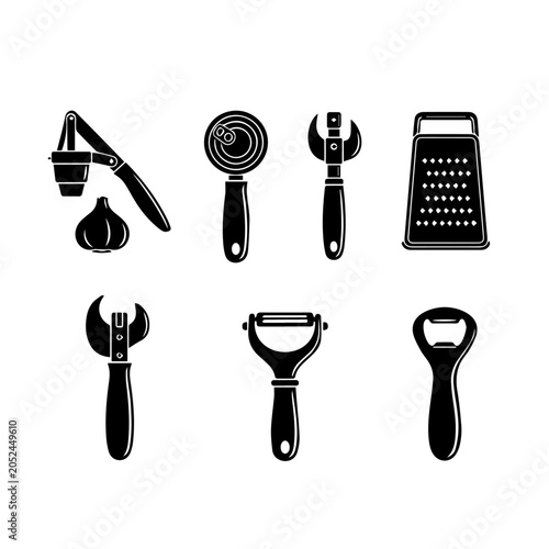 Kitchen tools arranged on white background for cooking preparation