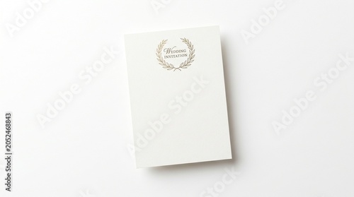 Elegant blank wedding invitation mockup with golden wreath design
