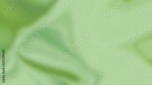 Soft green fabric texture background with smooth folds
