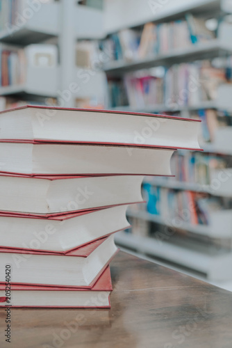 Stack of Books on Library Table – Education, Knowledge and Academic Learning Concept