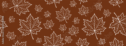 Seamless pattern with white maple leaves on a brown background