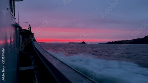 Boat Wake on Ocean at Colorful Sunset, 4K Cinematic Seascape with Pink and Purple Sky 01