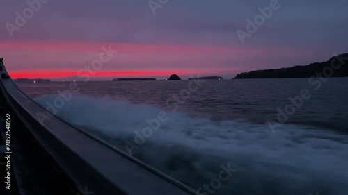 Boat Wake on Ocean at Colorful Sunset, 4K Cinematic Seascape with Pink and Purple Sky 02