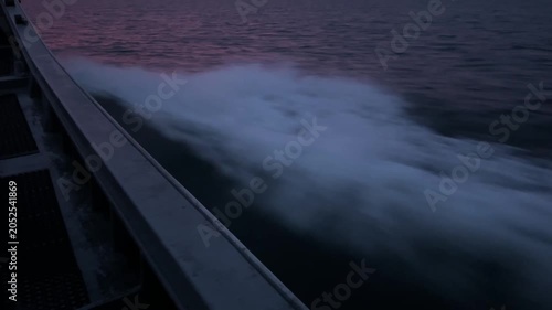 Boat Wake on Ocean at Colorful Sunset, 4K Cinematic Seascape with Pink and Purple Sky 03