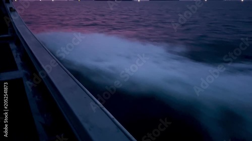 Boat Wake on Ocean at Colorful Sunset, 4K Cinematic Seascape with Pink and Purple Sky 04