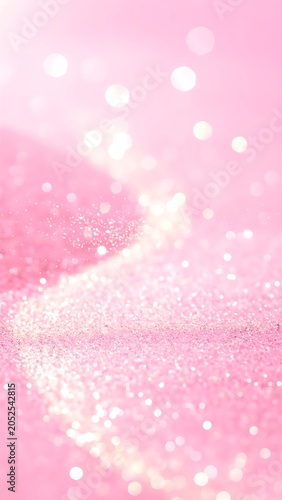 A pink glittery surface with white sparkles and bokeh lights