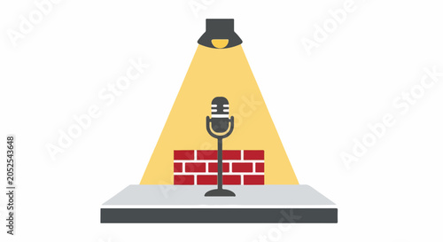 A microphone on a stage with a spotlight and brick wall backdrop