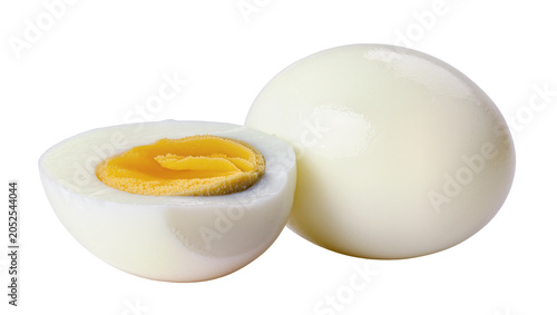Tableau sur toile Whole and halved hard-boiled egg with bright yellow yolk