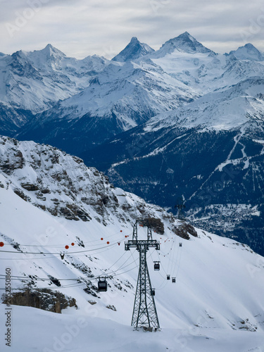Slika na platnu Scenic view from top station of Funitel Violettes-Plaine Morte with aerial lift