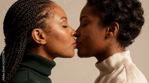 Intimate Moment Between Two Women Close Facial Interaction Emotional Connection Tenderness Expression