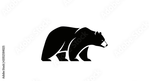 Tableau sur toile Black bear silhouette walking right.