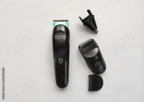 Electric trimmer for body grooming and hair removal. Modern device for shaving, personal hygiene and daily care.	