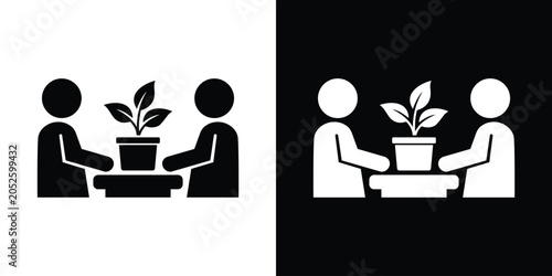 Foto Business growth and startup development icon showing two partners nurturing a plant in a pot over a table