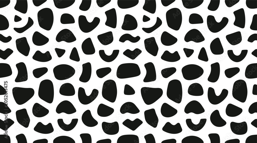 Fototapeta premium Seamless pattern featuring repeating black organic shapes and irregular blobs on a clean white background, for textile and surface