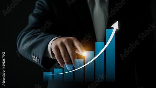 Executive Hand Guiding Digital Revenue Growth Through Strategic Business Transformation