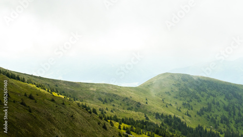 Green Mountain Landscape with Cloudy Sky, Pishkonya mountain range, Carpathians, mountain peak, fog, green silhouettes