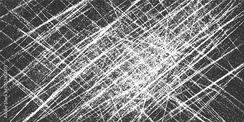 Chaotic crisscross white scratches on a dark gray textured background abstract black