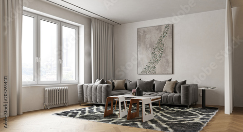 Obraz na płótnie Modern living room interior with a large grey sofa and nested coffee tables