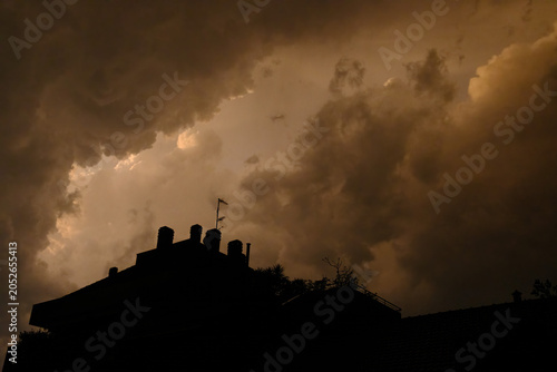 Canvas Print Stormy sky over buildings along via Piero della Francesca in Milan, Italy
