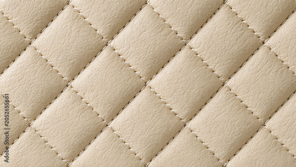 Fototapeta premium Premium quilted beige leather texture featuring stitched diamond pattern and luxurious upholstery detail