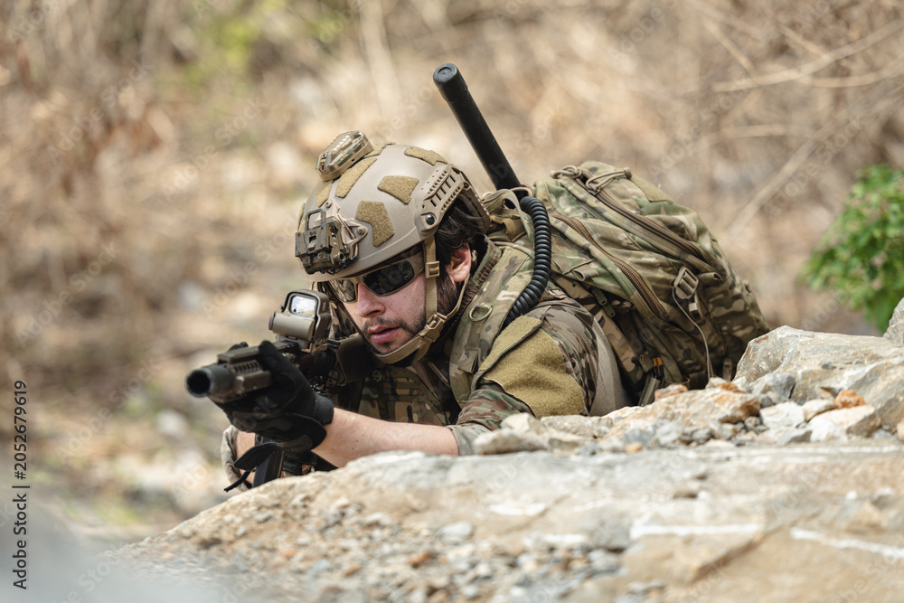 Fototapeta premium US Army military, Special forces soldier engaged in combat operation, tactical military in action