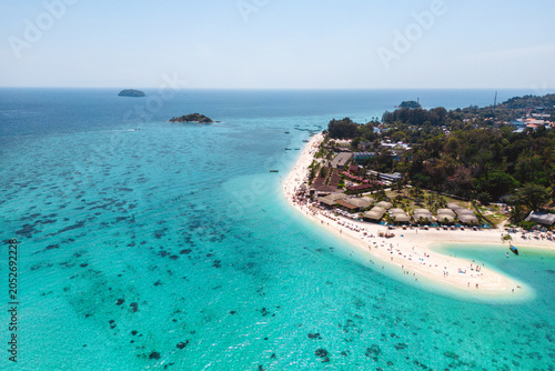 Aerial Drone View of Koh Lipe Island Beach with Turquoise Water and Longtail Boats, Thailand