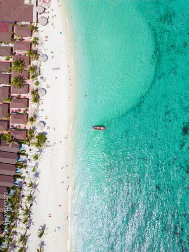 Aerial Drone View of Koh Lipe Island Beach with Turquoise Water and Longtail Boats, Thailand