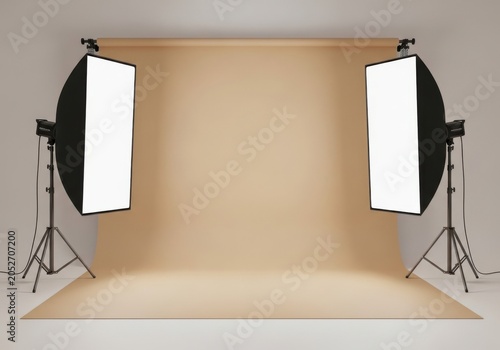 Studio setup with beige backdrop, and two softbox, light panels lighting