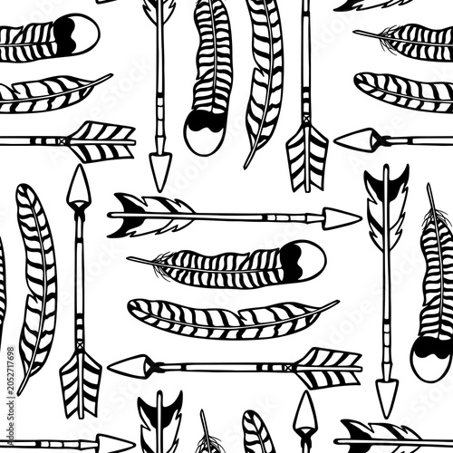 Vector seamless pattern with hand drawn Native American ethnic elements - feathers and arrows. Beautiful design elements, ink drawing. Perfect for prints and patterns
