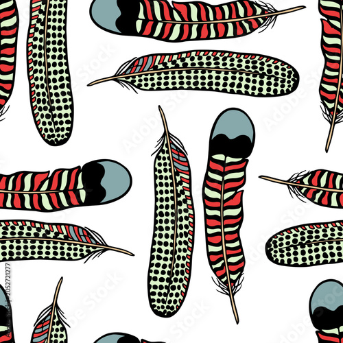 Vector seamless pattern with hand drawn bright patterned feathers. Beautiful ethnic design elements, ink drawing. Perfect for prints and patterns
