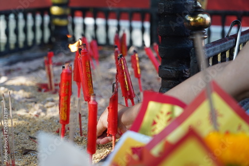 Quadro su tela Slow motion of smoke rising from incense pot at Buddhist temple.