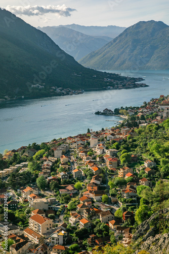 Boka kotorska bay from kotor montenegro with fortress walls mountains and old town view.