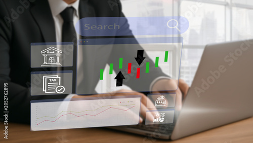 Obraz na plátne Business leaders analyze global business investment charts and graphs showing th