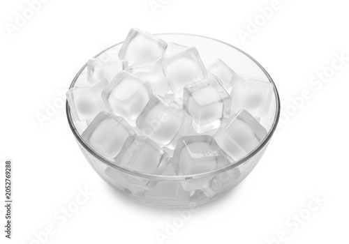 Large ice cubes in a clear glass bowl isolated on white background
