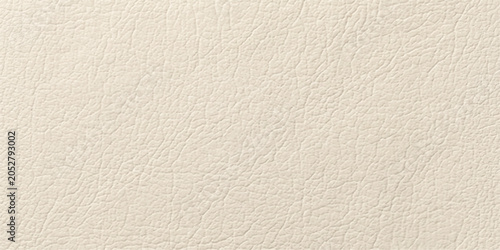 Fotografija A close-up view of a textured off-white surface, resembling fine leather or textured paper, offers a versatile background for various design applications