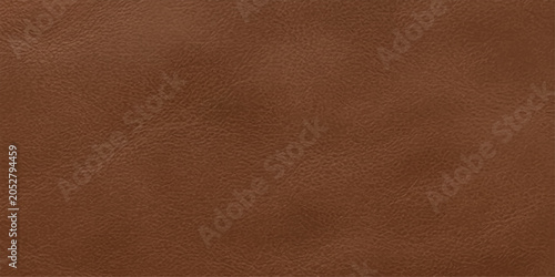 Photos A close-up shot showcases the rich texture and subtle grain of a brown leather surface, evoking a sense of natural luxury and craftsmanship
