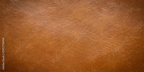 Foto A textured close-up of rich, natural brown leather, showcasing its unique grain and subtle imperfections