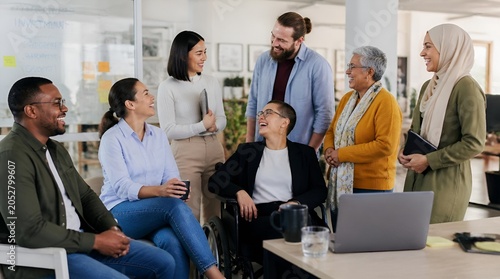 Inclusive corporate team meeting in a bright modern office.