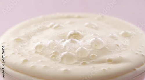 Fresh Dairy Cream in a White Bowl with Milk and Creamy Texture