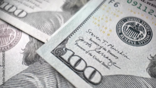 Stacking us dollar bills macro close up cash money accumulation finance wealth investment concept