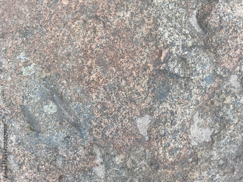 Photos Natural pink granite rock surface texture, ancient weathered stone background